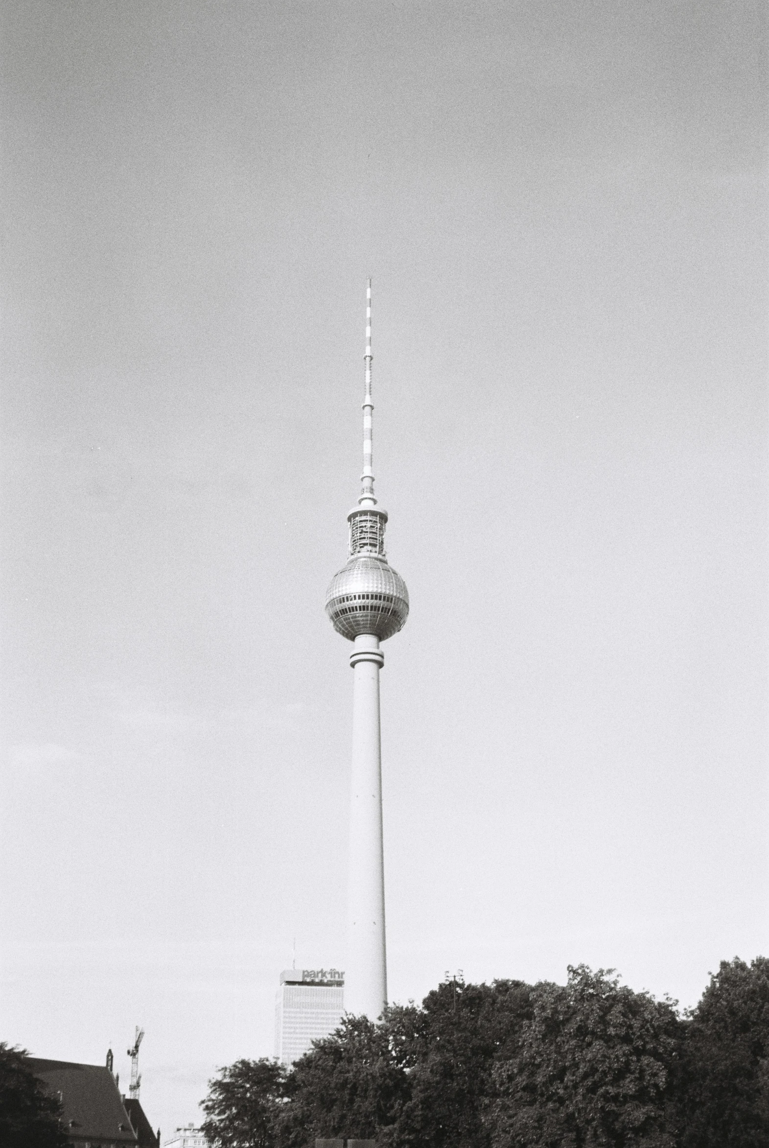 a black and white po of an outdoor clock