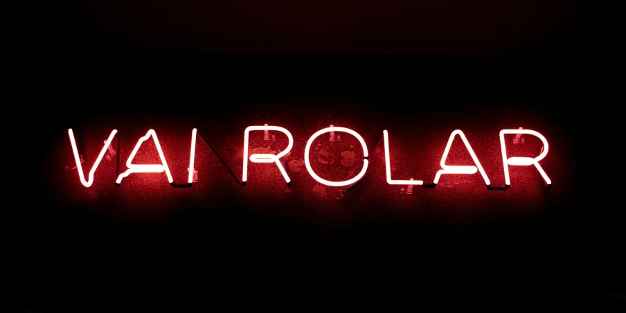 a neon sign that reads vapor on it