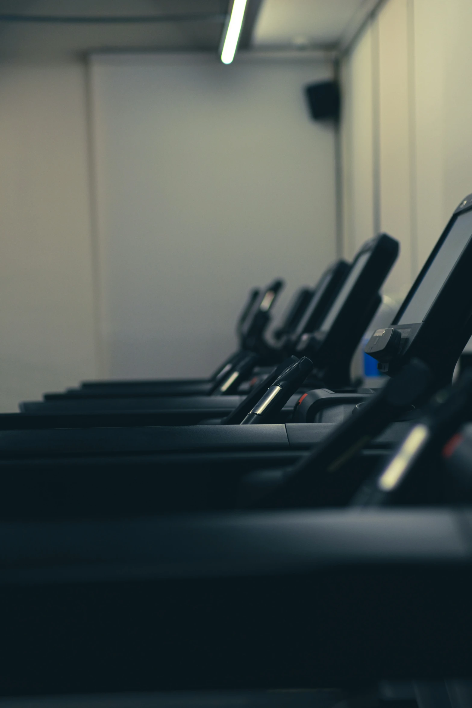 several rows of exercise treads sit in a room