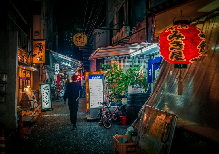 the sidewalk has many items on it with lights on them