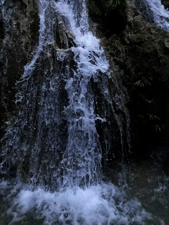 water running over the rocks to get out of it