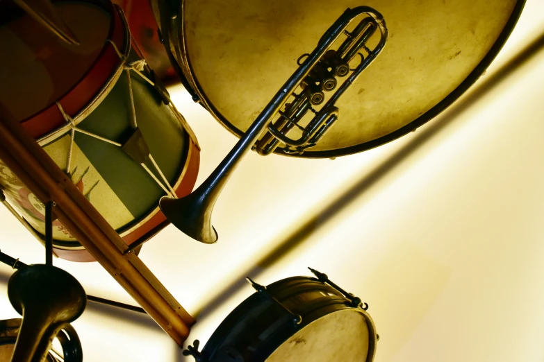 musical instruments that are hanging up and resting