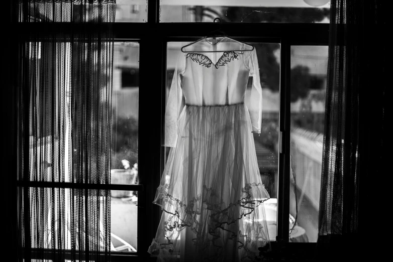 a dress in a window is made with beads