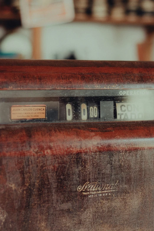 closeup of a radio receiver sitting in a wood case