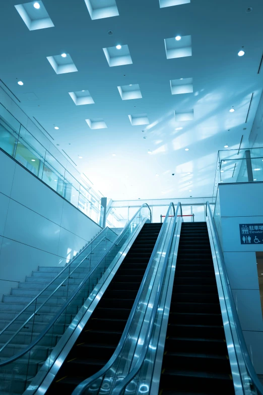 escalator and stairs at an airport terminal