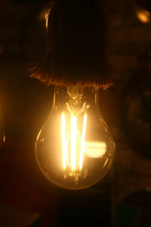 an old light bulb is turned on and on
