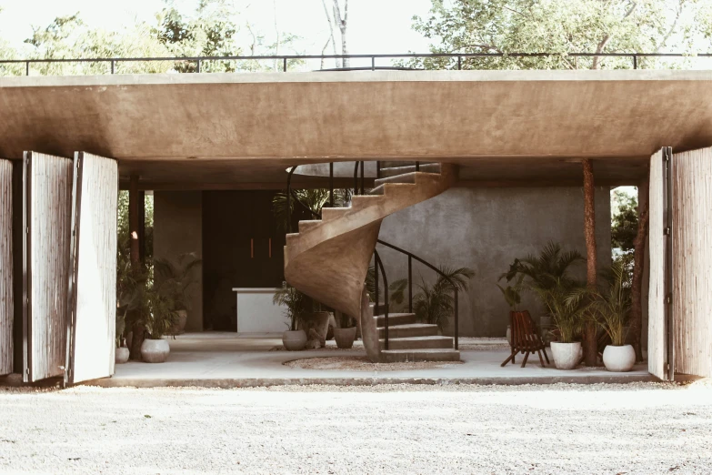 a brown stairs leading into a small home