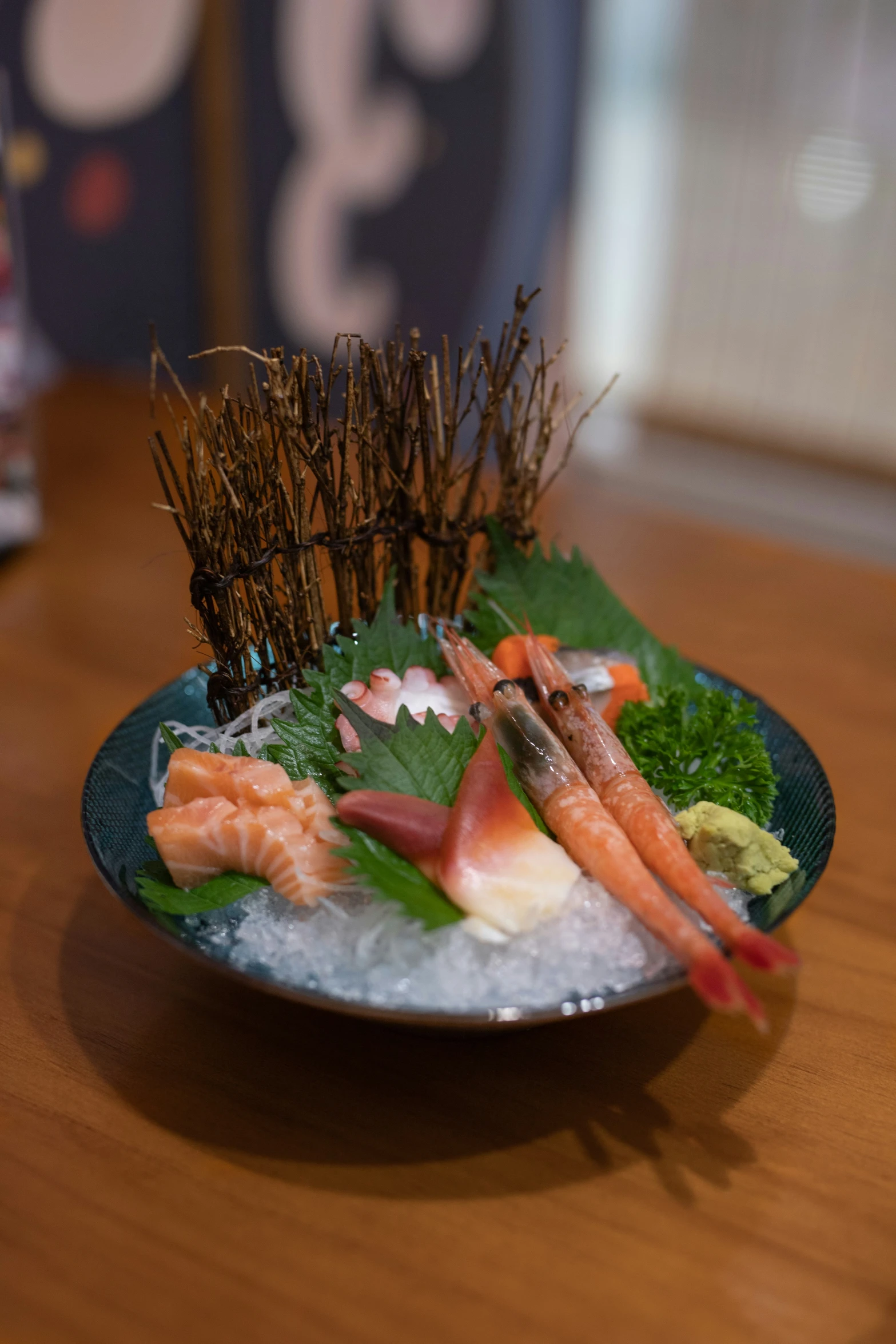 a plate of raw seafood and vegetables on ice