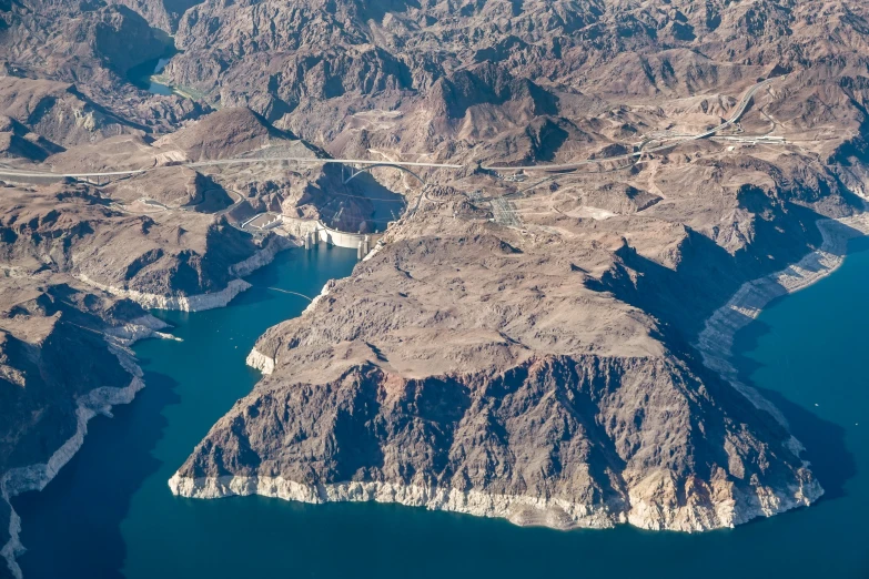 the view out an airplane window over a mountainous region