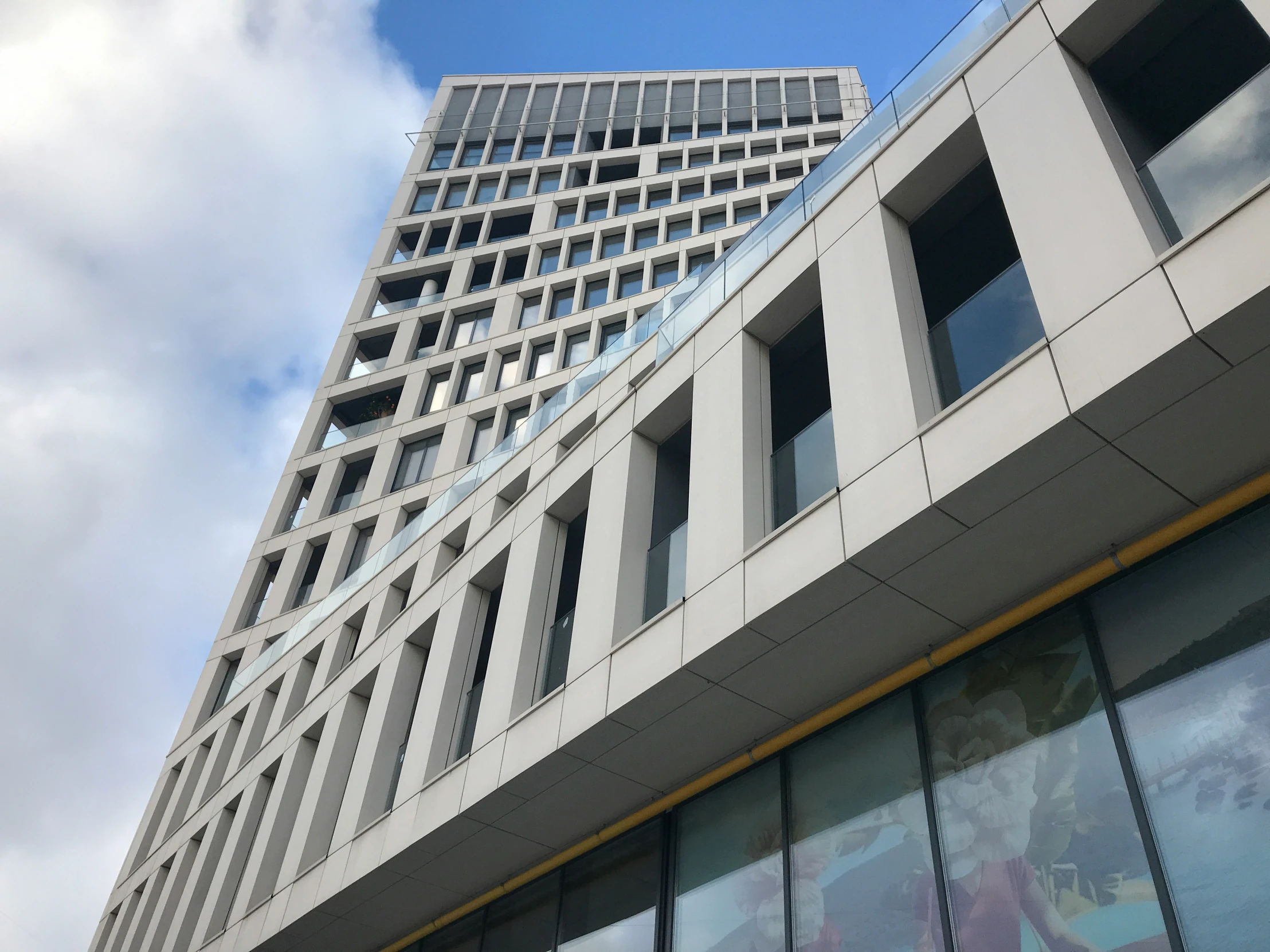 the top of a building with many windows