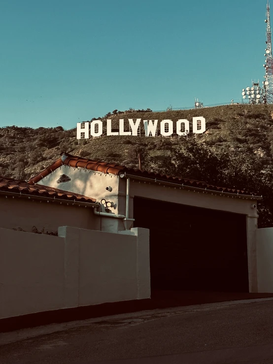 the hollywood sign atop a building in california