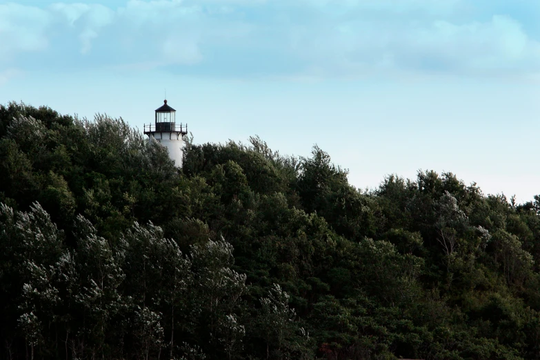 there is a large light house atop the hill