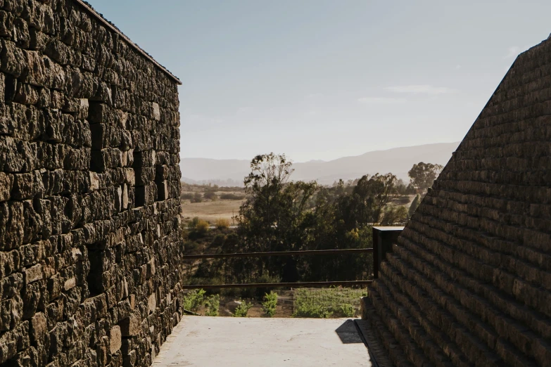 looking out over the landscape from one of two buildings