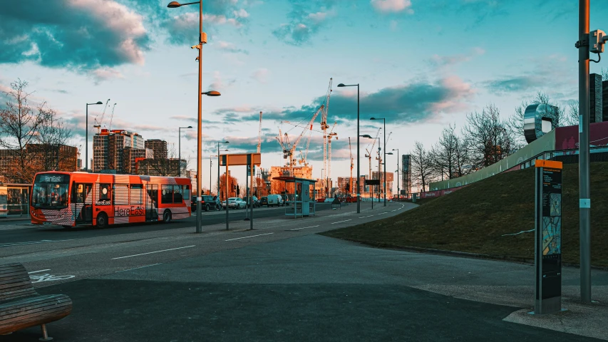 a city street with a bus stop and benches