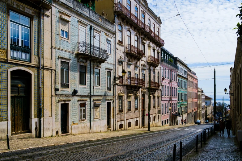 an old street is surrounded by stone buildings