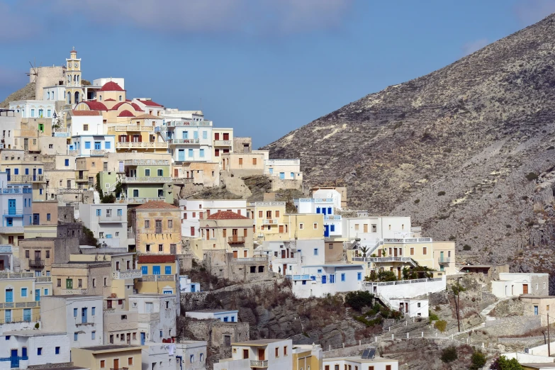 colorful buildings with some mountains in the background