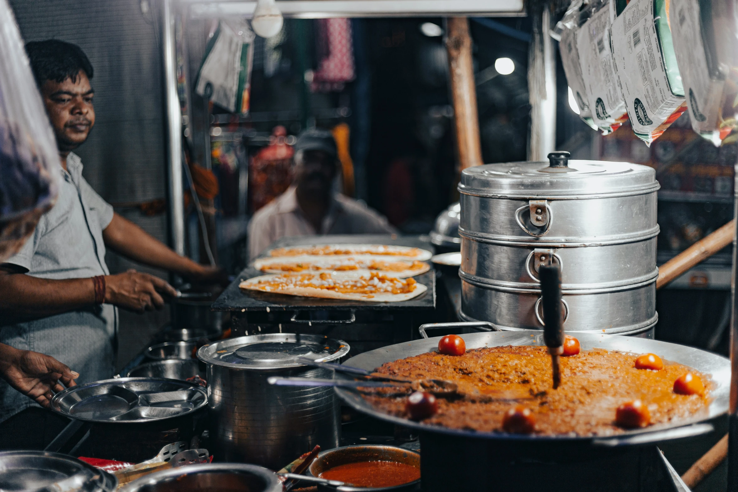 this is an outdoor food stall full of food