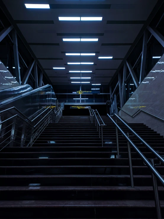 a set of stairs leading down to an office building