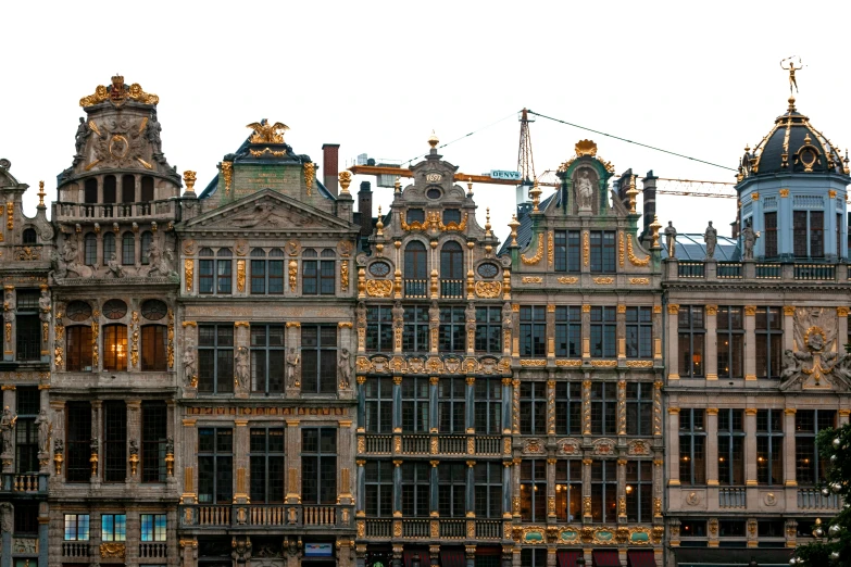 a group of ornate buildings stand in the city