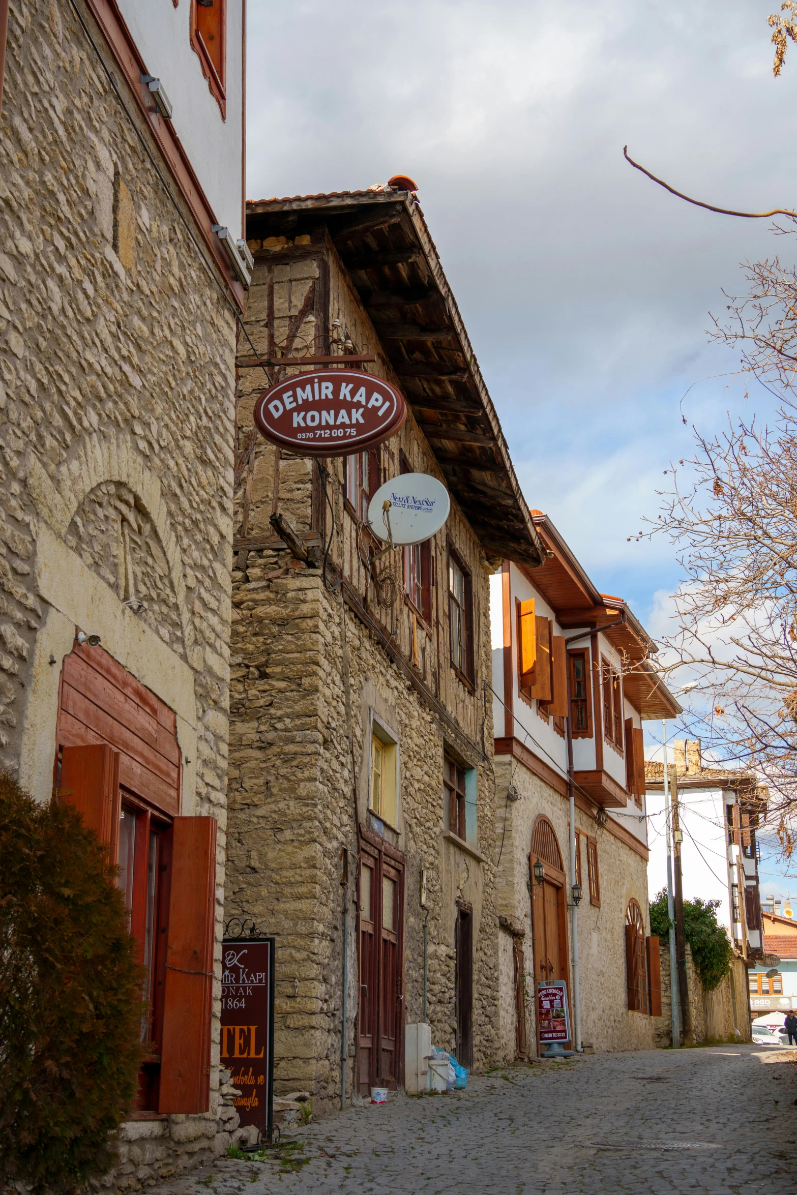 a brick building with a sign on the outside