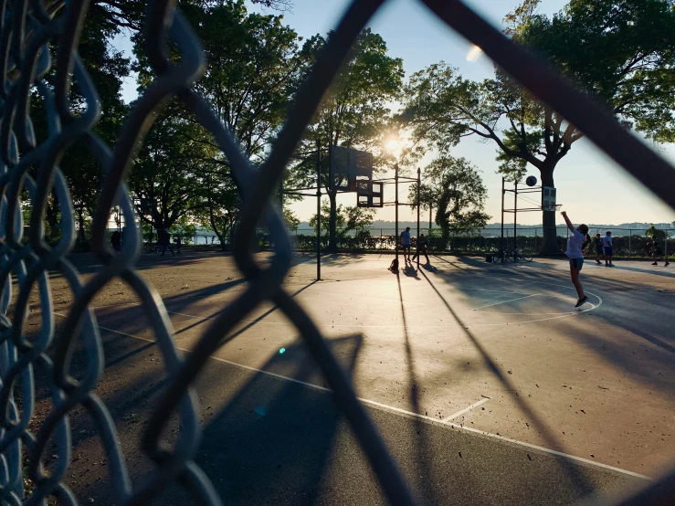 some people playing tennis on a court