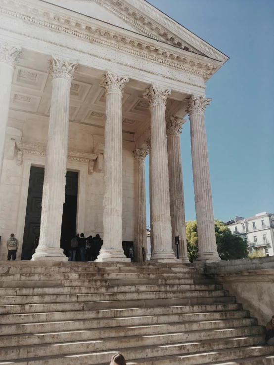 an image of a dog sitting on the steps