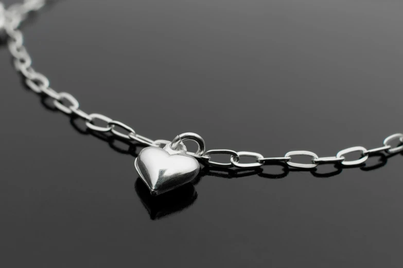 a chain that has a heart on it