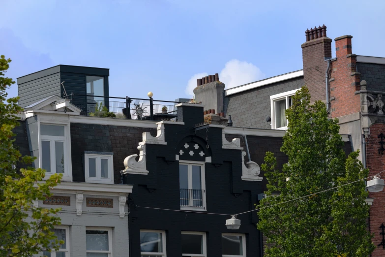 a very tall black building with some windows