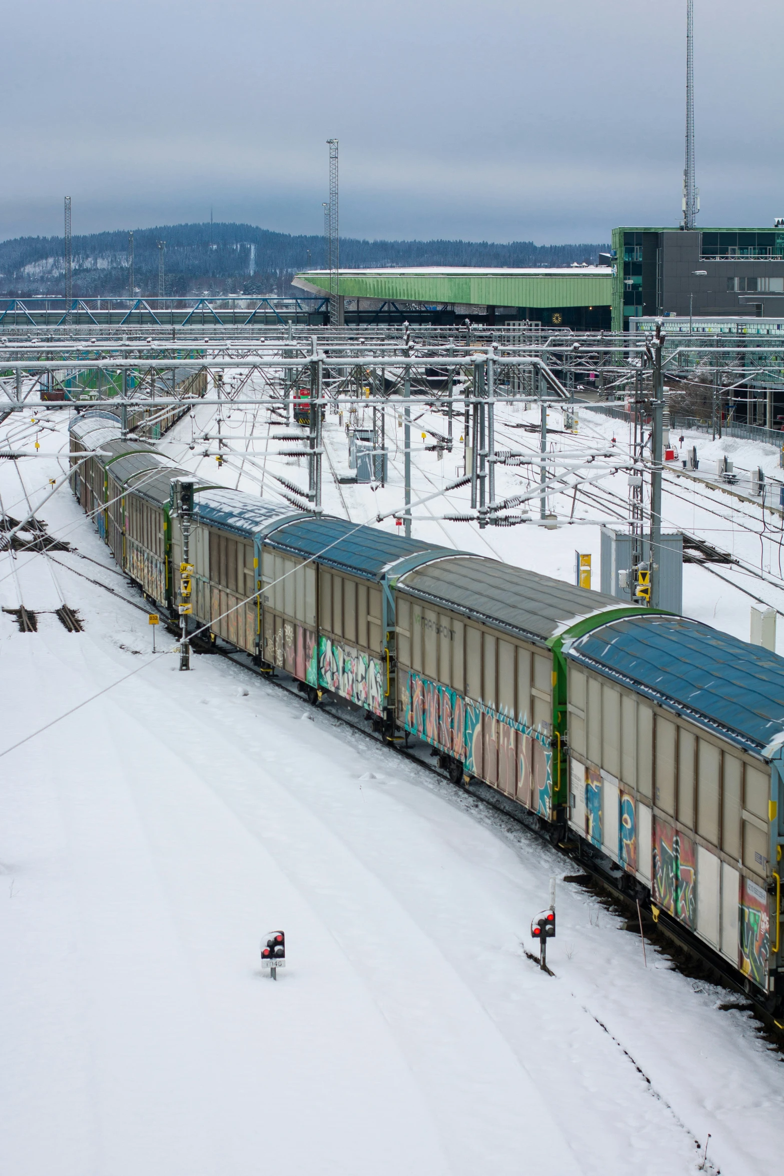 train in snow moving around in the distance