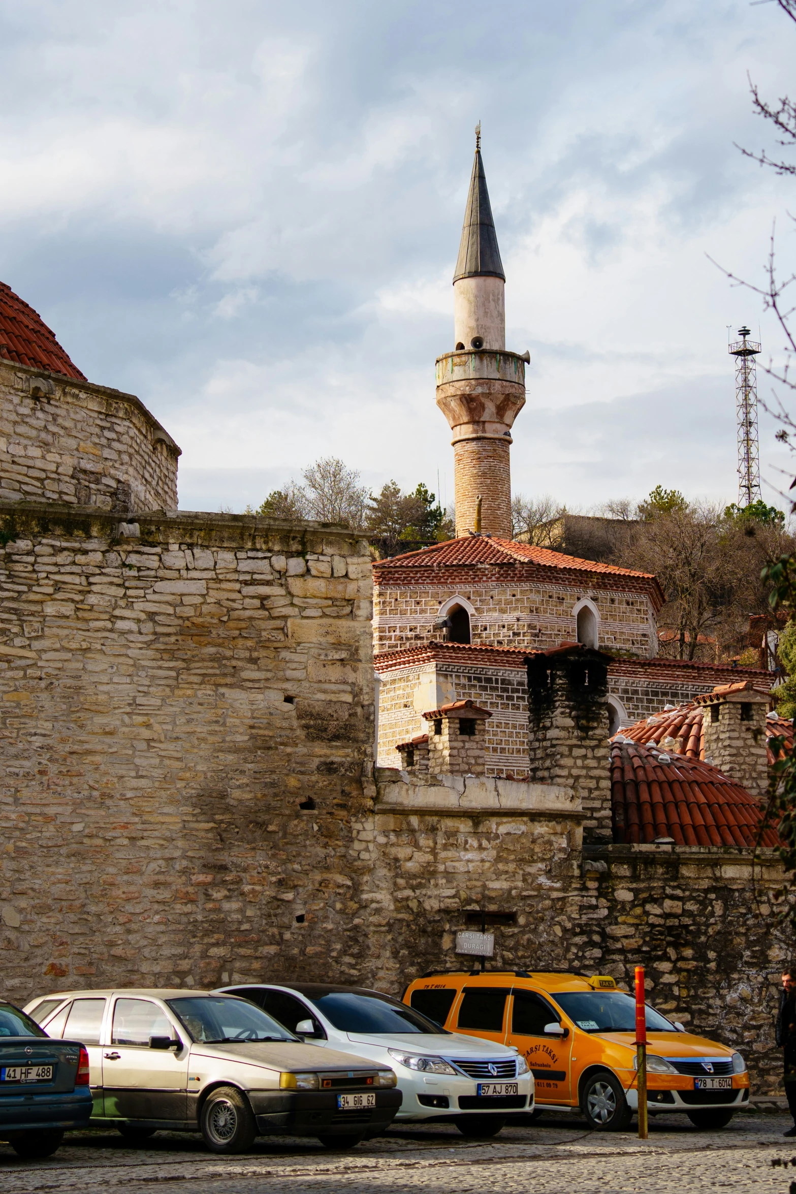 a street with cars parked along the side of it