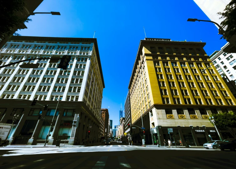 an upward view of the buildings along a street