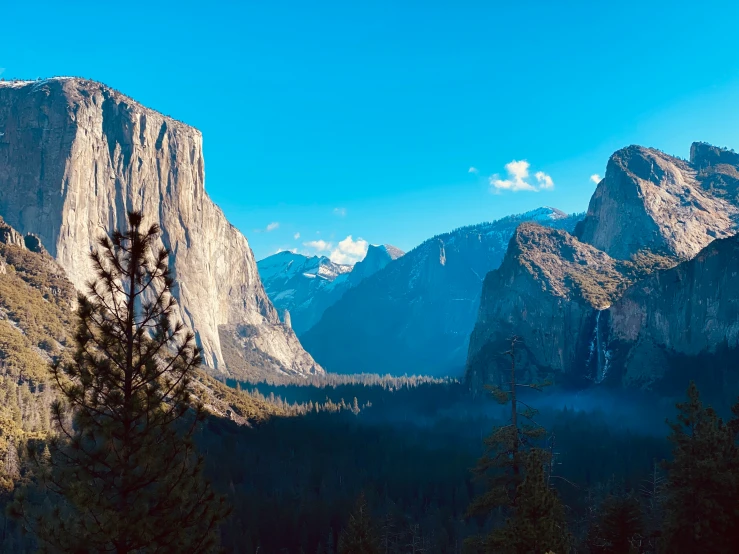 view into a valley from behind a mountain