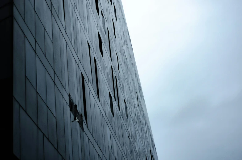 a high building near the sky with lots of windows