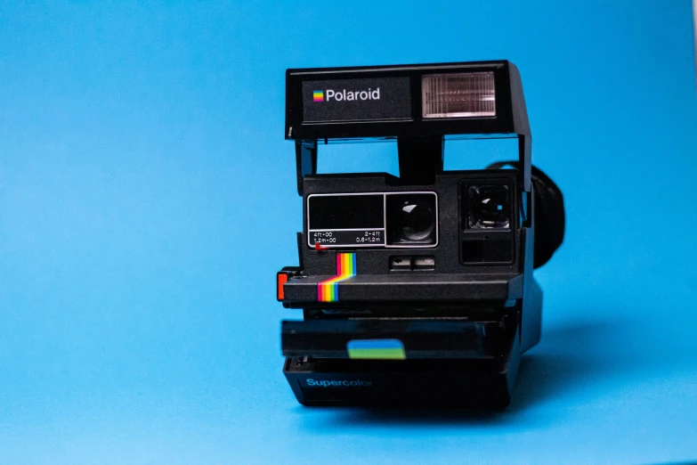 a polaroid instante type camera with polaroid lens