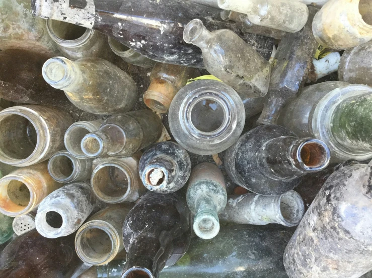 large amount of various jars and bottles displayed in outdoor display