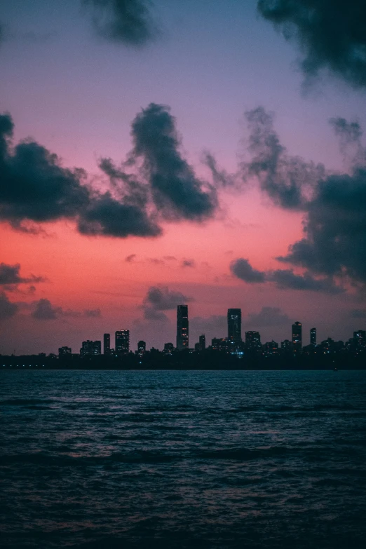 skyline and clouds on a sunny day at night