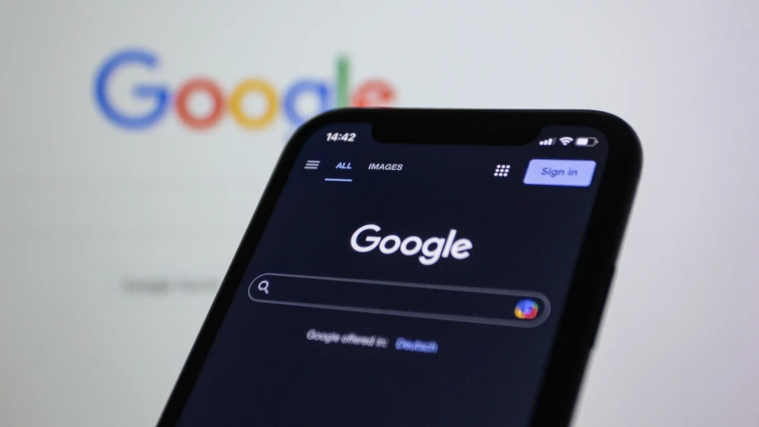 a closeup s of an iphone screen displaying the logo of the google