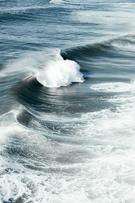 there is a wave breaking in the ocean