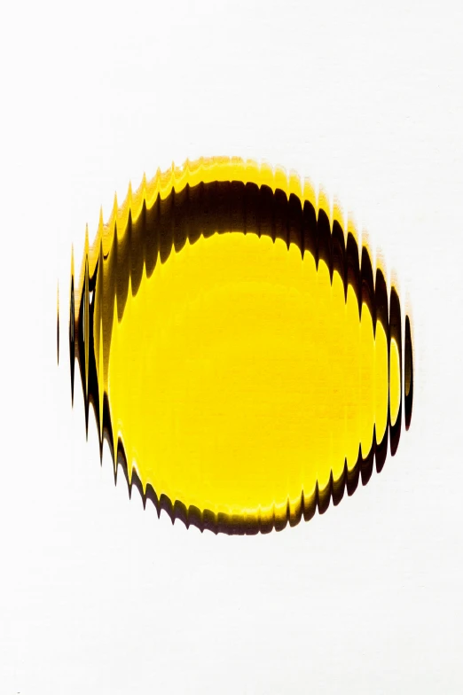 yellow object on white background with small holes