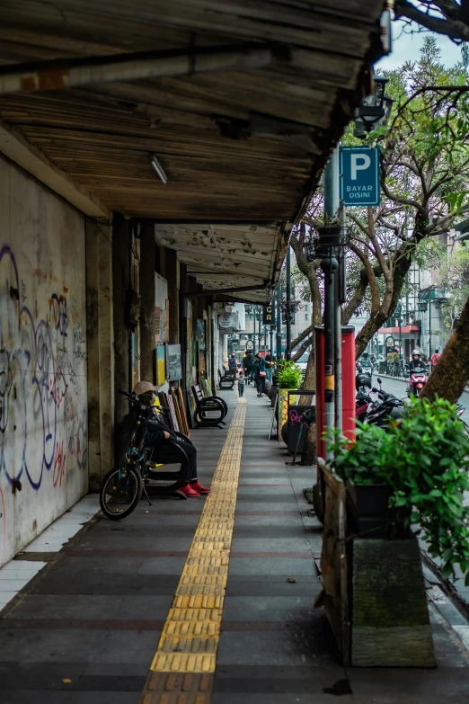 a bunch of motorcycles parked on a side walk