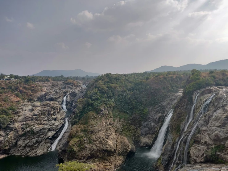 an aerial view of the falls on a cloudy day