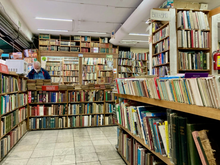 large assortment of books on shelves in liry