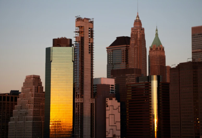 the skyline of city with high rise buildings in the background