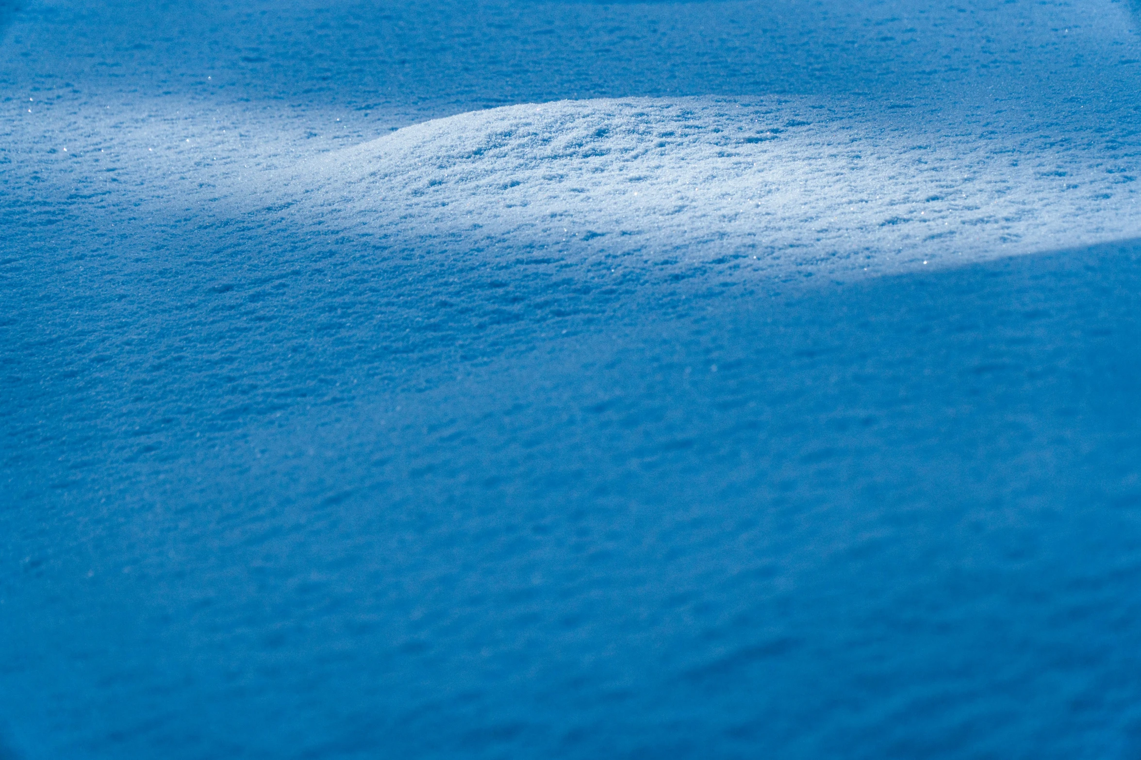 snow covered ground with a large amount of white substance