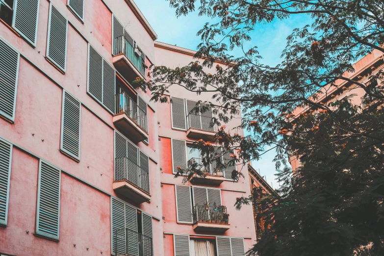 a couple of windows in the side of a building