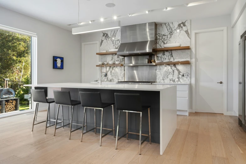 two chairs are sitting in the middle of the counter