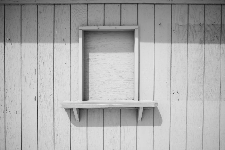 a black and white po of two shelves