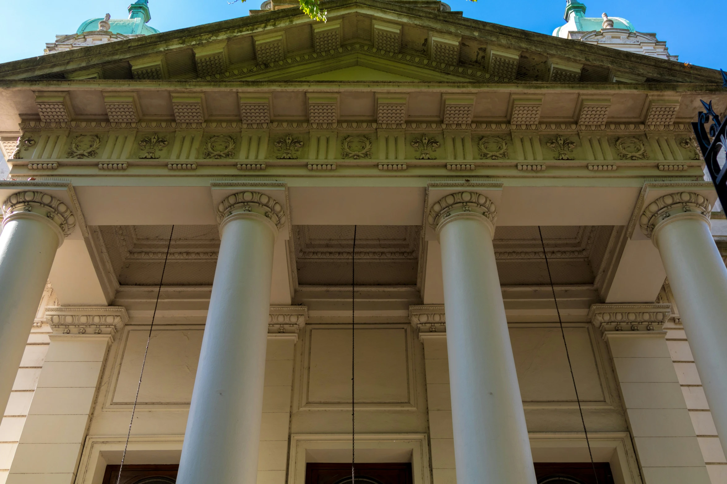 pillars and the front of a white building