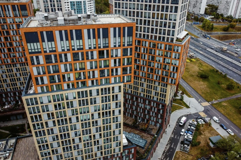 large buildings along a busy highway near a highway