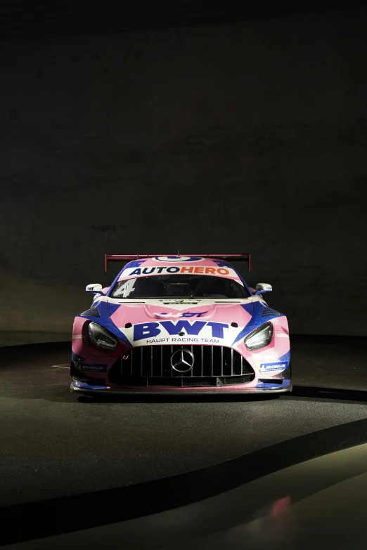 a red and white car in the dark